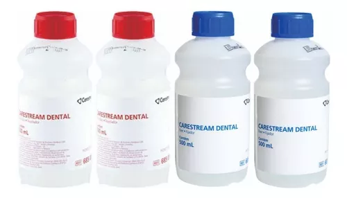 quatro frascos de revelador odontológico